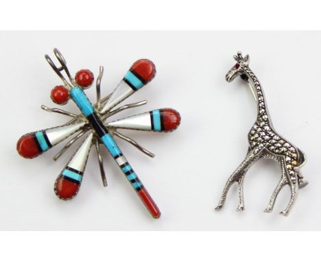 A vintage Navajo or Zuni people silver brooch formed as a dragonfly, set with mother of pearl, turquoise and bloodstone, unma