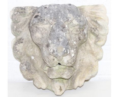 An antique or vintage carved stone lion mask wall fountain head, 42cm x 21cm x 40cm