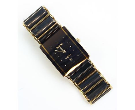 Rado - a vintage Rado Diastar ref 160.0281.3N, ceramic and gold plated links, black face with date aperture, bracelet with si