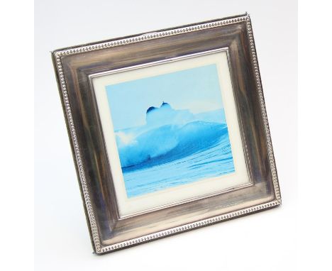 A modern square silver photograph frame, Sheffield 2001 by Whitehill Silver &amp; Plate Co, 18cm square