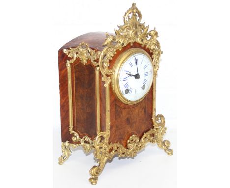 An antique French style mantel clock by Lenzkirch of Germany, Kingwood case with gilt metal or ormalu mount, white enamel dia