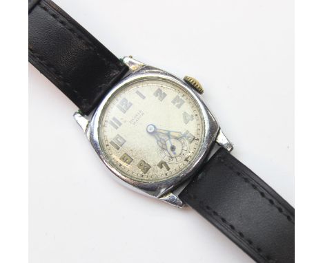 A vintage Homis watch with silvered cushion shaped dial, luminous numerals and hands, chrome plated case, hand winding mechan