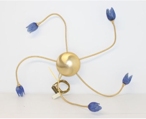 A highly decorative brass wall or ceiling light with 5 flexible arms and blue glass tulip shades, approx 105cm wide from oppo