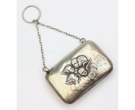 An antique silver purse or evening bag decorated with Reynold's Angels, marked for Birmingham 1914 by Samuel M Levi, clasp br