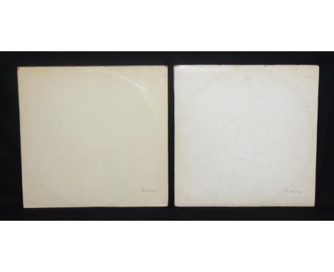 Two copies of The Beatles "White Album" vinyl LPs, numbers 79983 (mono) and 2963574 (stereo) [2]