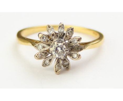 [3.01g, Q] - an 18ct gold and diamond floral cluster ring, indistinctly marked and XRF confirmed as 18ct gold