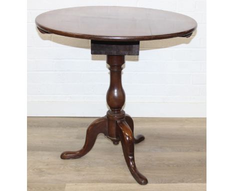 An antique mahogany tilt topped table with splayed tripod base, 19th century, 73cm in diameter 72cm tall