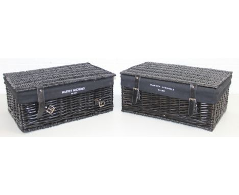 Two black Harvey Nichols hamper baskets with buckled straps and canvas lining, 44cm x 32cm x 20cm [2]