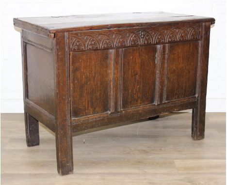 An antique oak coffer with carved details and candle box to interior, likely 18th century, unusual small proportions, 98cm x 