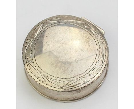 A small round silver pill box with engraved decoration, marked 925 and XRF confirmed, 32mm in diameter