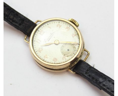 A vintage ladies 9ct gold cased watch with leather strap, Everite movement, London 1953, 11.21g gross