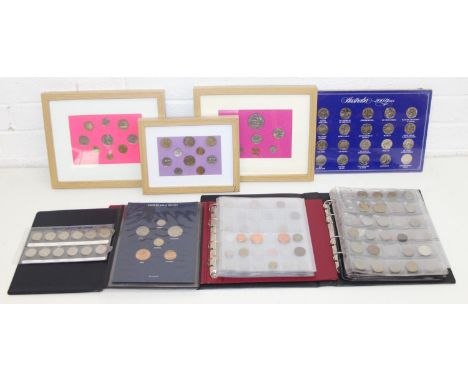 Three coins albums with contents and a number of framed coin displays, one of the album containing commemorative crowns and t