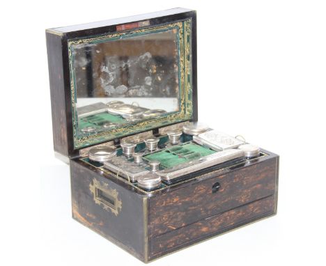 A Victorian ladies' coromandel vanity box with mirror, silver-plated topped jars and scent bottles, removable tray with segme