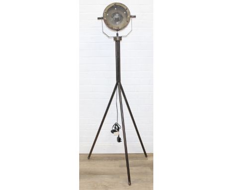 An industrial style floor standing lamp with tripos legs, 165cm tall