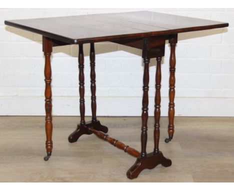 An antique rosewood Sutherland dropleaf table with turned legs, 69cm x 49cm x 53cm when open
