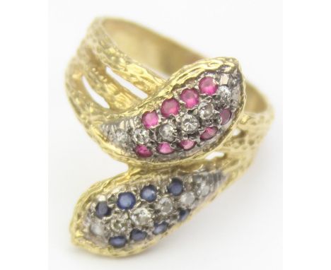[8.85g, Q] - a retro 18ct gold diamond ruby and sapphire ring formed as a pair of entwined snakes, each snake head set with s