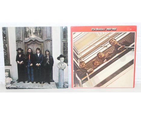 Two The Beatles vinyl LPs to include German pressing of 1962-1966 (red compilation album), PCSP 717, and USA version of Hey J