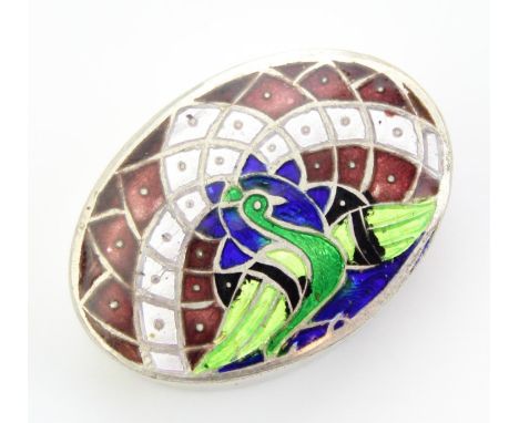 A small silver and enamel pill box decorated with a peacock, possibly Indian, unmarked but XRF confirmed as at least 95% pure