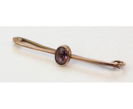 [1.49g] - a 9ct gold bar brooch set with amethyst, unmarked but XRF confirmed as 9ct gold, base metal pin, 45mm wide