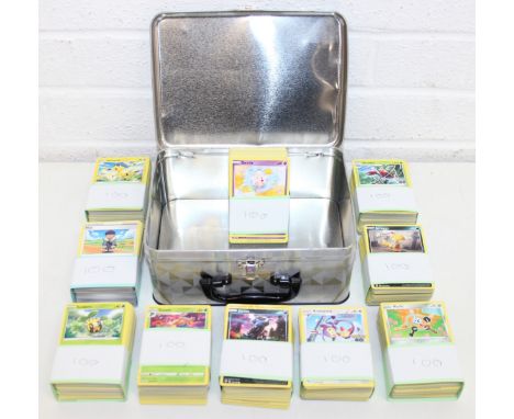 Pokémon tin with 10 bundles of 100 collectors cards (1000)&nbsp;all character cards