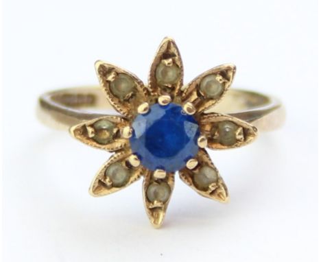 [2.82g, L] - a vintage 9ct gold and floral set ring, a central sapphire surrounded by white stones, marked for Birmingham 197