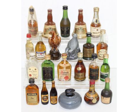 Qty of mixed alcohol miniatures to incl Bacardi, Beneagles Whisky, Bell's, Hennessy etc (Beswick eagle and curling stone are 