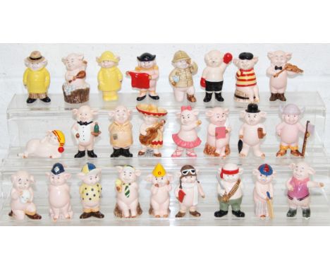 A complete set of twenty five Piggies figures by Danbury Mint [25] 