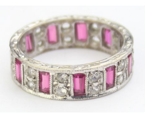 [4.02g, N] - a vintage 9ct white gold eternity ring set with diamonds and baguette cut rubies, marked for Birmingham 1990