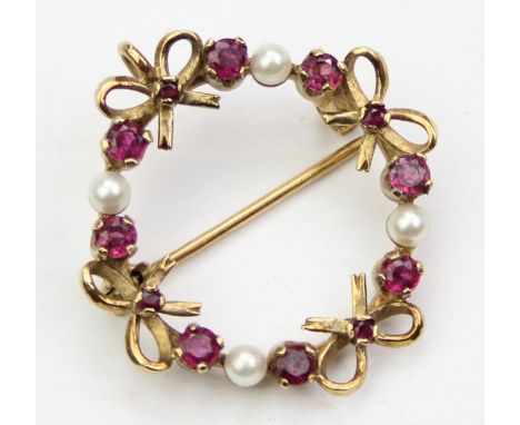 [4.23g] - a vintage 9ct gold brooch set with seed pearls and rubies mounted with bows, marked 375 and XRF confirmed, 28mm, bo