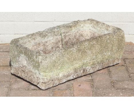 An antique carved stone garden trough or planter, likely 19th century, 57cm x 30cm x 19cm