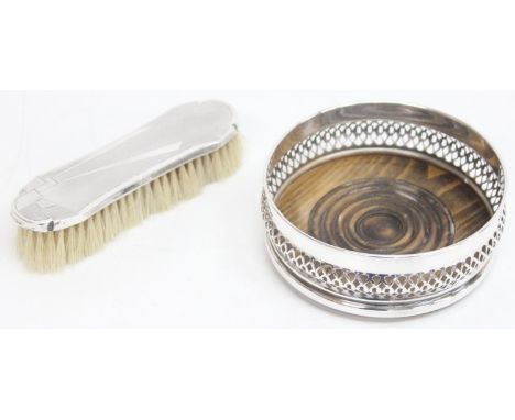 A silver backed clothes brush with Art Deco design, marked for Birmingham 1932 by Daniel Manufacturing Company, and a silver 