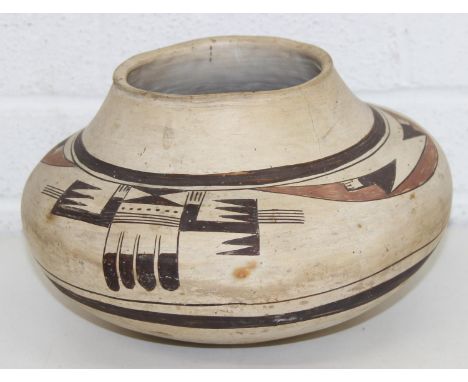 Attributed to Nampeyo of Hano (Hopi-Tewa, 1859-1942), a native American Hopi pottery vase with Zuni style polychrome decorati