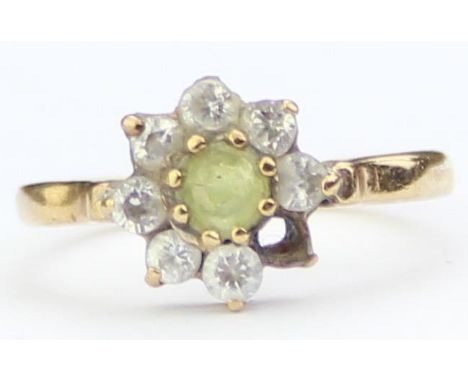 [1.92g, K] - a retro 9ct gold white and green stone ring with floral setting, marked for London 1989, one white stone missing