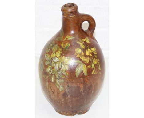 An unusual antique hand painted stoneware jug, Bellarmine type but lacking mask, hand painted with scenes of foliage and butt