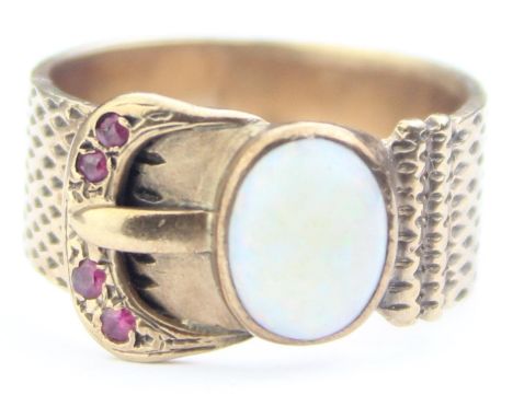 [6.07g, P] - a vintage 9ct gold buckle ring set with a large cabochon opal and small rubies, textured band, marked 9ct and XR