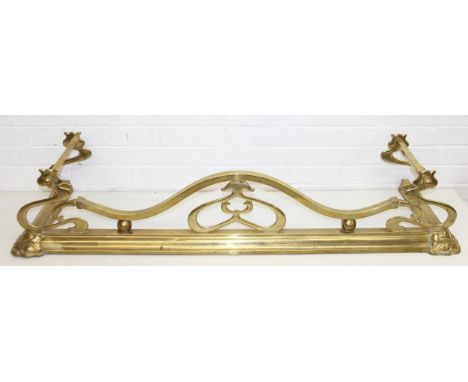 A large brass Art Nouveau period fire fender or fire kerb, 140cm x 40cm x 27cm