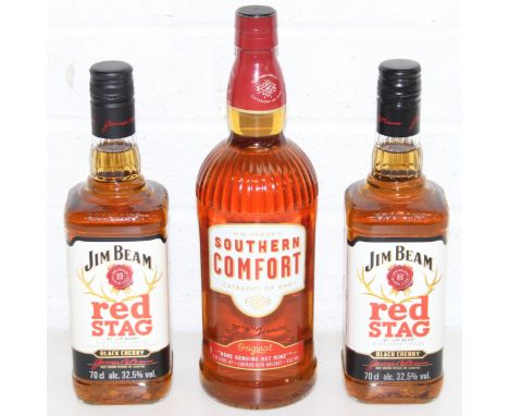 A litre bottle of Southern Comfort and two bottles of Jim Beam Red Stag Black Cherry, 70cl [3]