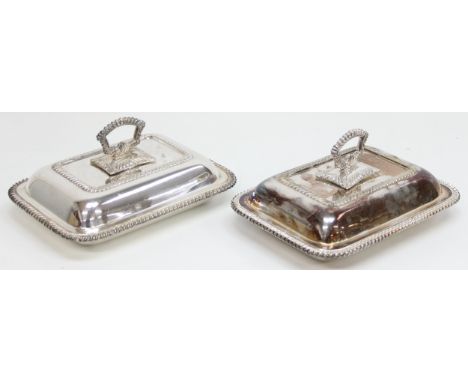 A pair of antique silver plate or Sheffield plate entree dishes and covers, marked to the base for Barker Ellis, each 29cm wi