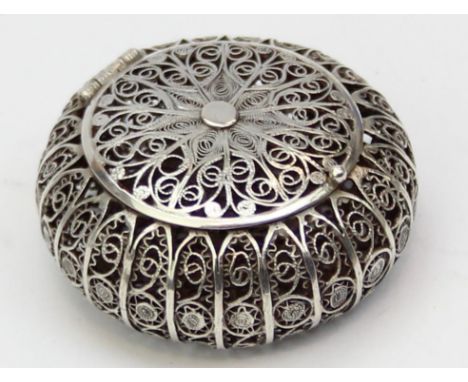 A small silver filigree pill box, possibly Portuguese but unmarked, XRF confirmed as 925 silver, 38mm in diameter, 11.37g