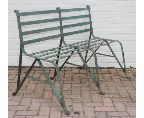 Antique green painted wrought iron garden bench with scroll end detail, late 19th or early 20th century, 123cm x 72cm x 87cm