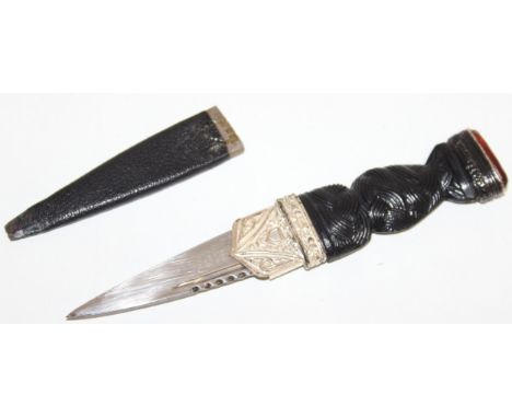 A vintage Scottish Sgian Dubh dagger with silver plated mounts and Celtic style woven handle, 19cm long