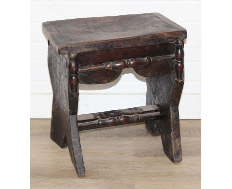 An unusual antique elm stool with shaped top and decorative accents, unusual design, 18th or 19th century, 40cm x 28cm x 44cm