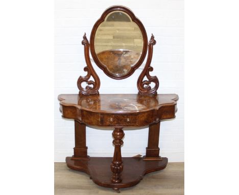 A Victorian walnut dressing table of shaped demi-lune form with single drawer and quatrefoil shaped mirror, 103cm x 51cm x 14