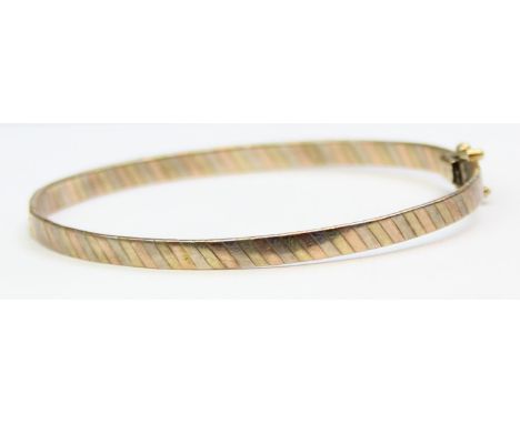 [9.53g] - a retro 9ct gold bangle formed from white, yellow and rose gold, various marks including import marks for London 19
