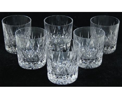 A set of 6 good quality crystal glass whisky tumblers, seemingly unmarked but very heavy with star cut bases, each 10cm tall