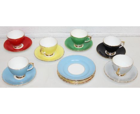 A vintage Sheridan fine bone china harlequin tea cup and saucer set with side plates 
