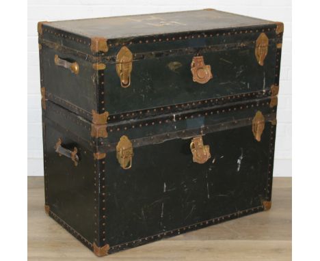 Two large vintage travelling trunks with brass bound corners and studded details, largest 92cm x 52cm x 56cm [2]