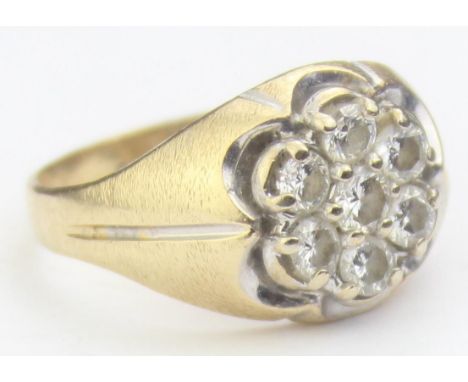 [5.57g, T] - a retro 14ct yellow gold and diamond floral cluster ring, seven diamonds assessed as 0.25ct each (1.75ct total w