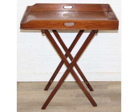 A vintage mahogany butler's serving tray on folding stand, 75cm x 49cm x 86cm