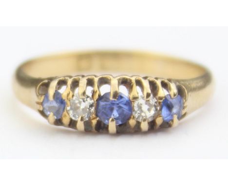 [2.03g, I] - an antique 18ct yellow gold, diamond and sapphire ring, three blue sapphires flanking two diamonds, band with pa